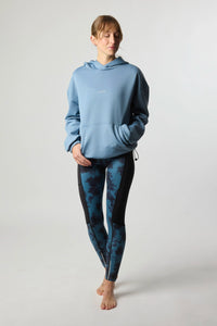 SUDADERA CON CAPUCHA TECH LIGHT BLUE