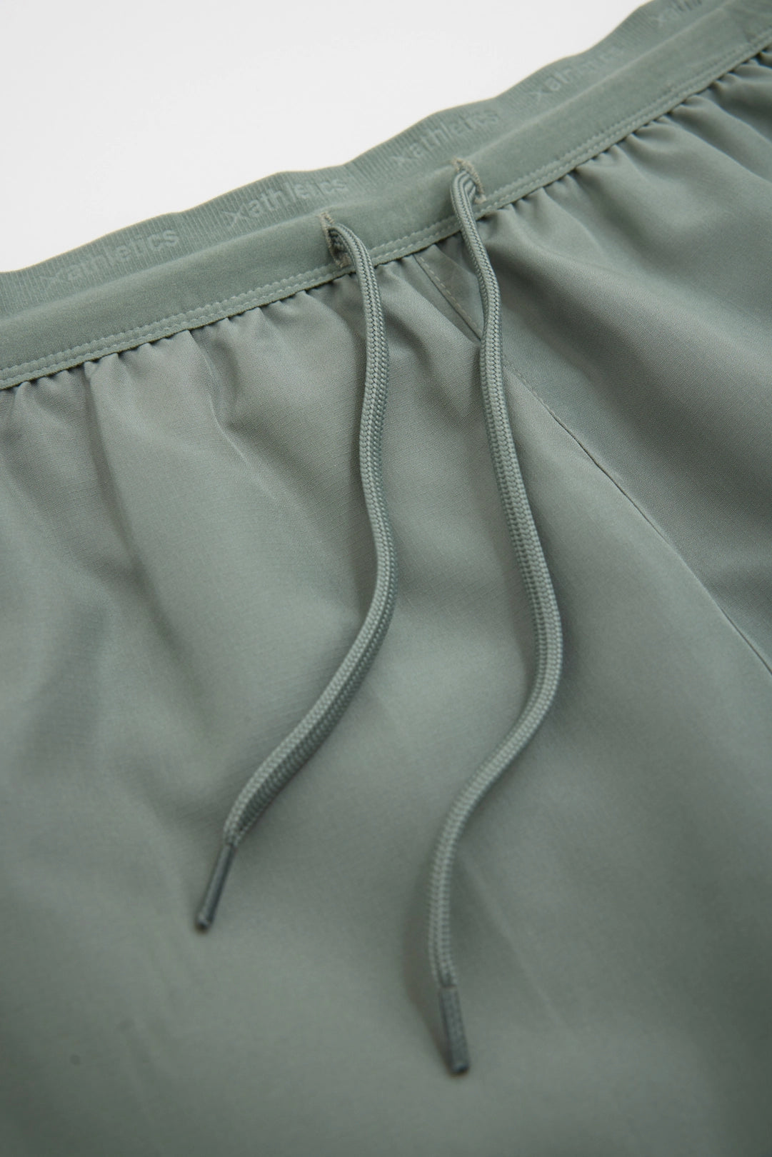 OLIVE GREEN TRAIN SHORTS